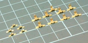 Spring hangers and bump stops