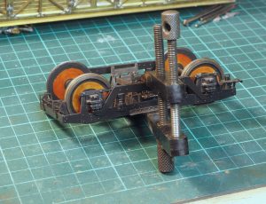 Clamping the equalising beam to assist soldering.